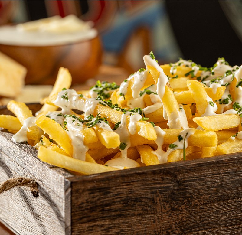 PCG Burgers fries served in a wooden crate